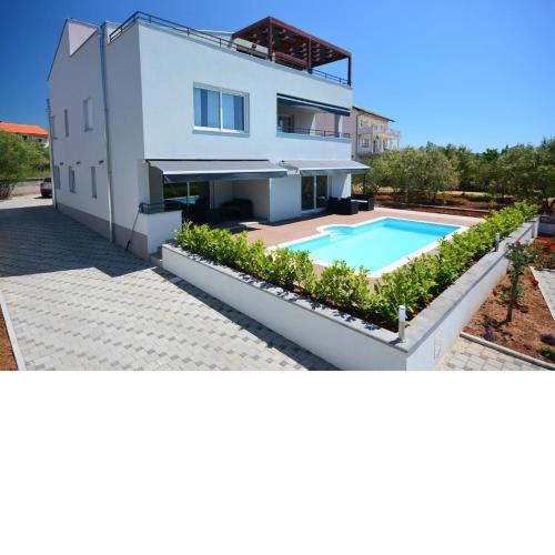 Apartment 1 with the swimming pool