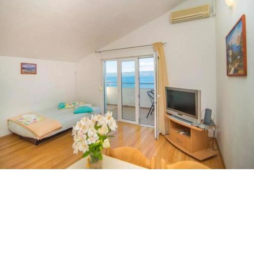 Apartment in Dugi Rat with sea view, terrace, air conditioning, WiFi 5113-4