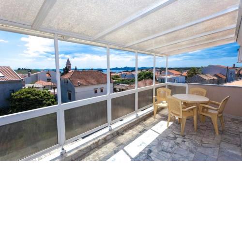 Apartment in Pakostane with sea view, terrace, air conditioning,WiFi 3475-4