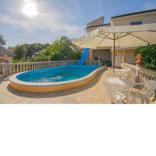 Apartment Liljana with shared swimming pool