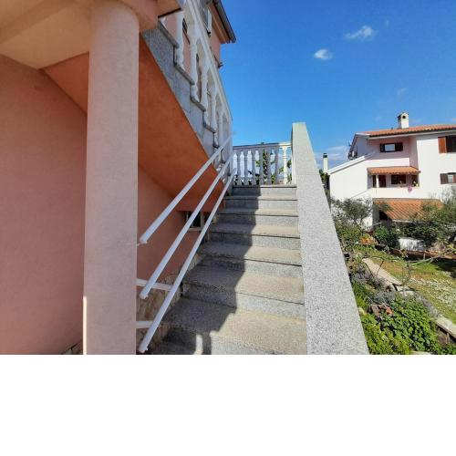 Apartment Tihana with a Partial Sea View