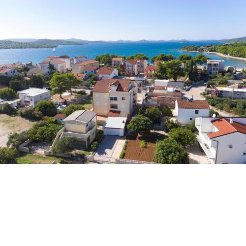 Apartments by the sea Pirovac, Sibenik - 15659
