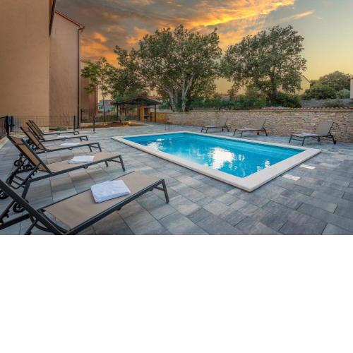Apartments Cesare with Shared Pool