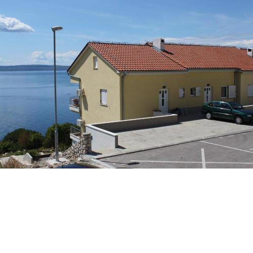 Apartments with a parking space Novi Vinodolski - 7503