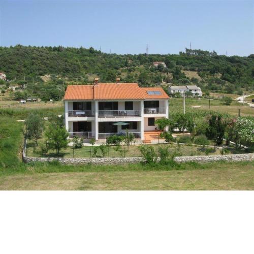 Apartments with a parking space Palit, Rab - 16356