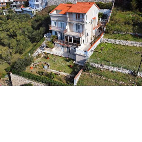 Apartments with a parking space Rab - 14120