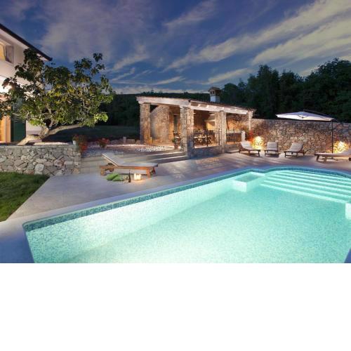 Attractive villa with private swimming pool beach volleyball and fenced garden