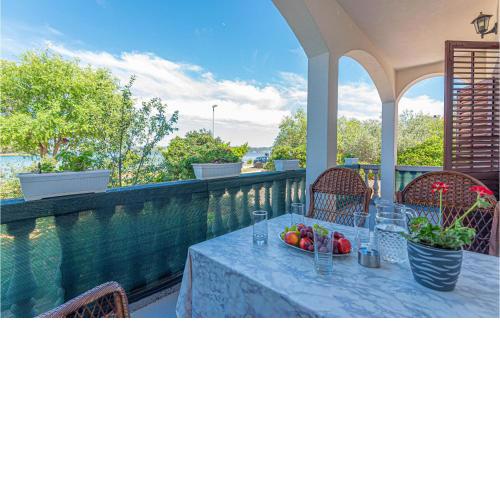 Awesome Apartment In Raslina With House Sea View