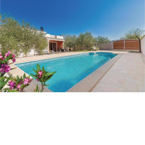 Awesome Home In Jezera With Outdoor Swimming Pool