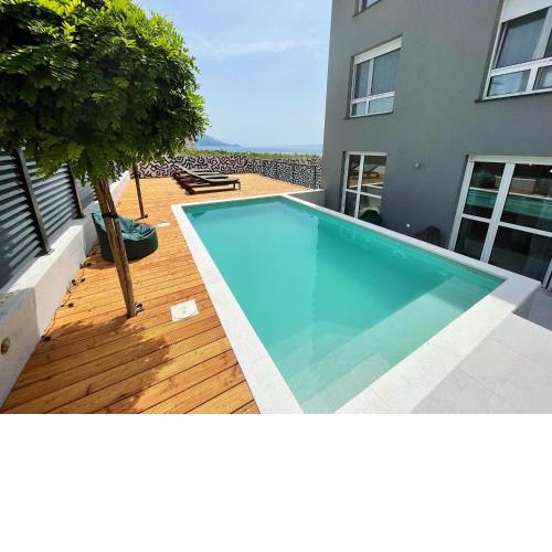 Cozy seaside apartment with pool & terrace