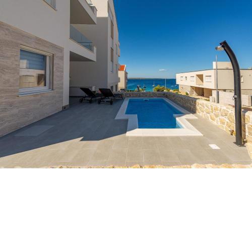 Dolphin view with a pool by the beach