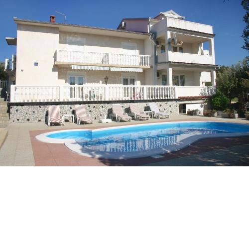 Family friendly apartments with a swimming pool Barbat, Rab - 4951