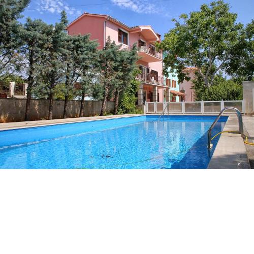 Family friendly apartments with a swimming pool Krnica, Marcana - 3029