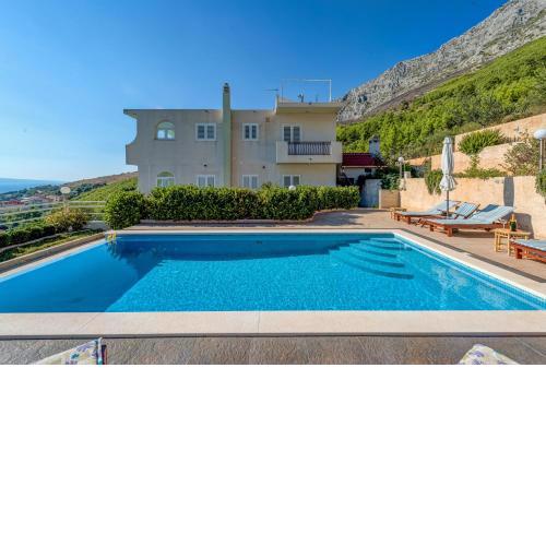 Family friendly apartments with a swimming pool Lokva Rogoznica, Omis - 16429