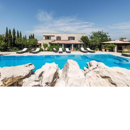 Family friendly apartments with a swimming pool Murter - 20819
