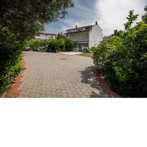 Family friendly apartments with a swimming pool Palit, Rab - 4990