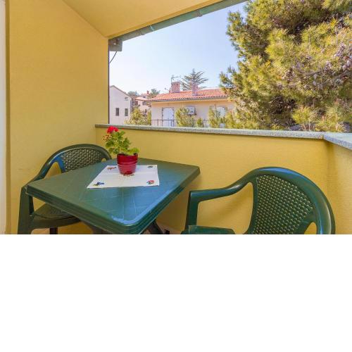 Ferienwohnung in Premantura mit Küche, Bad, Klima, Grill und einem Balkon mit Meerblick