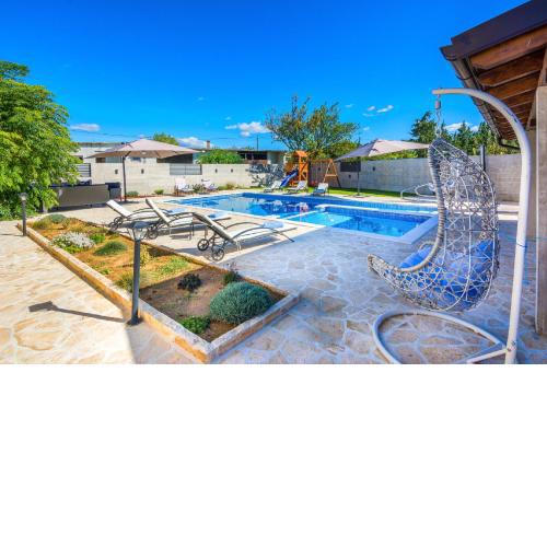 Holiday Home Tower with private pool, sauna and quads
