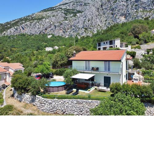 Holiday house with a swimming pool Gornji Tucepi - Podpec, Makarska - 6815