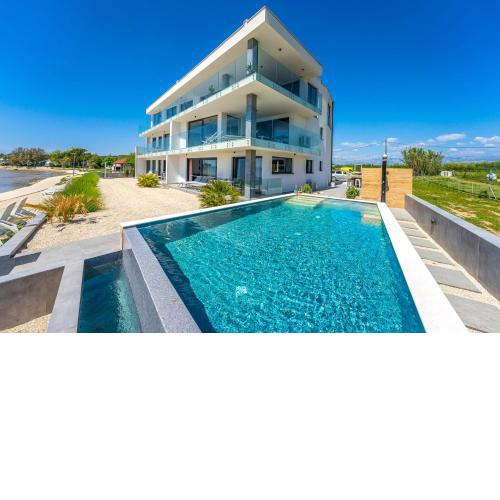 JamC Dream Familientraum direkt am Meer mit beheiztem Pool