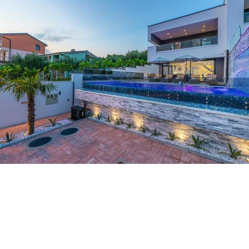 Luxury Villa Lorena with heated pool, jacuzzi,sauna and seaview