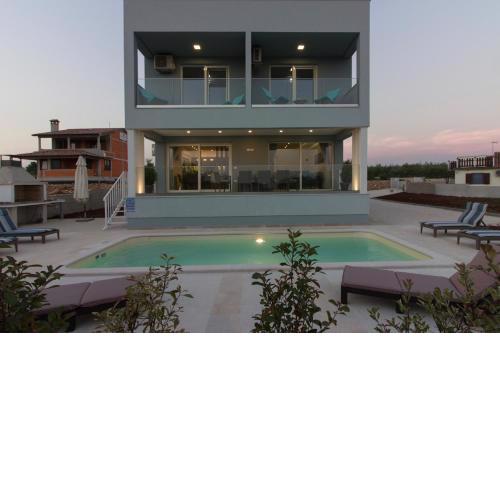 Modern villa Horizont with sea view pool and playroom
