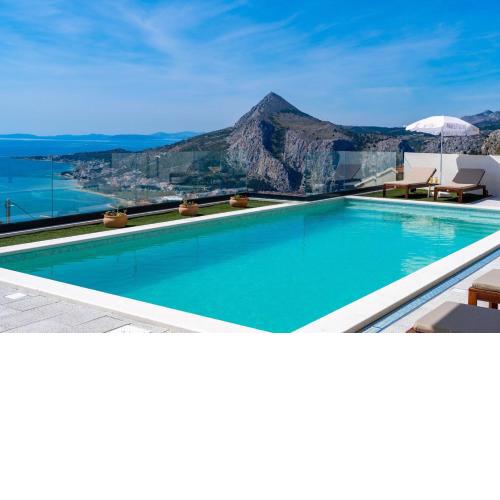 New! Villa BAMM with heated 36sqm pool, 5 en-suite bedrooms and panoramic sea views