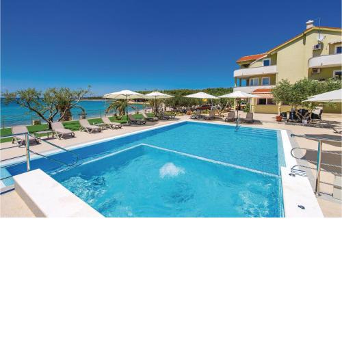 Nice Apartment In Povljana With House Sea View
