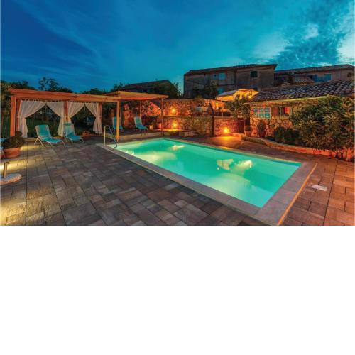 Nice Home In Malinska With Outdoor Swimming Pool
