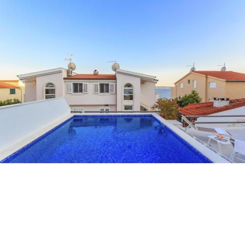 Seaside apartments with a swimming pool Rastici, Ciovo - 1084