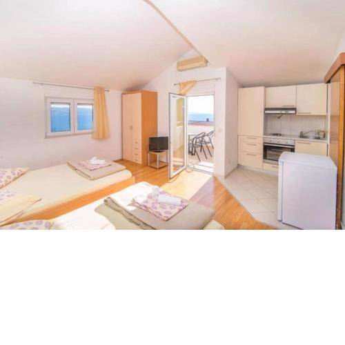 Studio Apartment in Dugi Rat with Sea View, Terrace, Air Conditioning, WiFi 5113-1