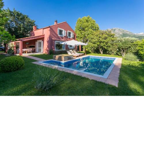 Stunning Red Cottage with a Pool