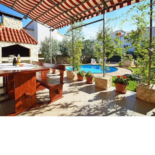 Three Apartment Complex With Pool