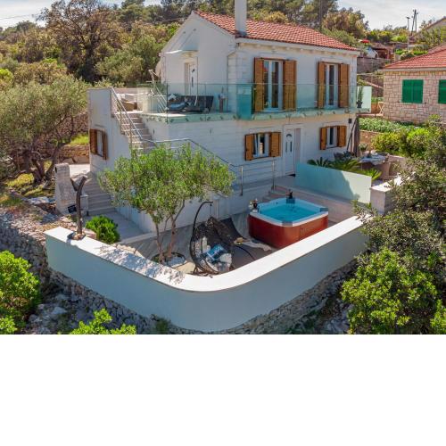 Uniquely designed Villa Ivana with outdoor Jacuzzi nearby the pebble Banje beach at the Island of Solta