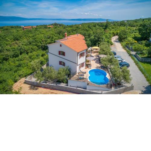 Unterkunft mit Sauna, Meerblick, Whirlpool und beheiztem Pool