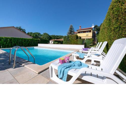 VILLA LIVIA with three nice apartments, swimming pool, childrens playground, barbecue and free parking