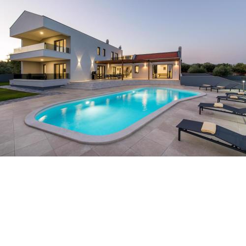 Villa Posidonia near Pula with sea view and surrounded by olive trees