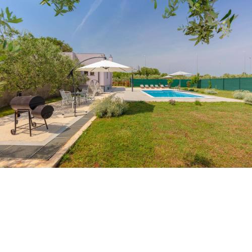 Villa VIOLA with pool, whirlpool, playground & bbq in a olive grove with sea view, near the beach, Pomer - Istria